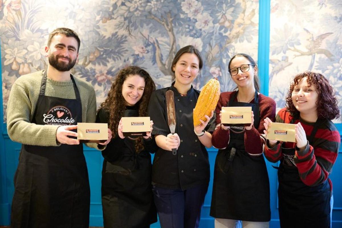 a group of people holding up boxes of food