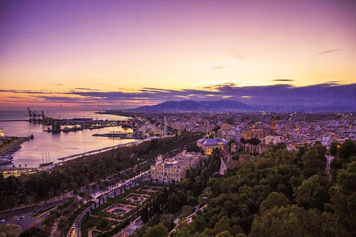 an aerial view of a city with a river