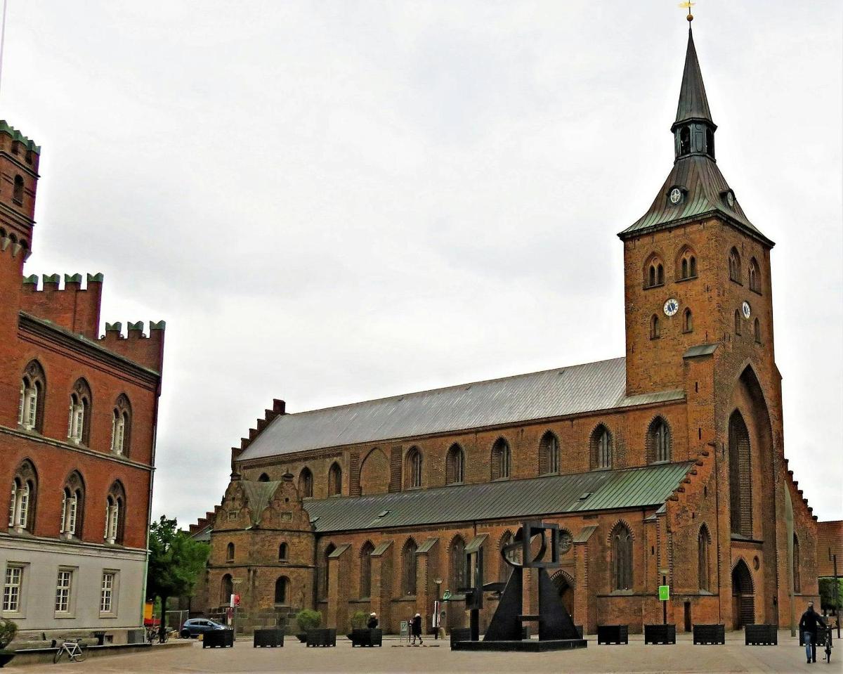 a large brick building with a clock tower