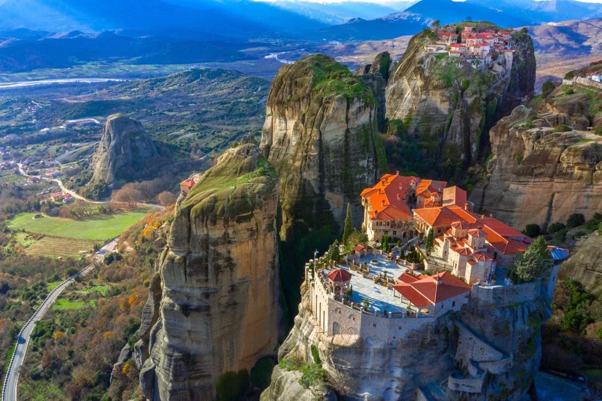 a monastery perched on the side of a mountain