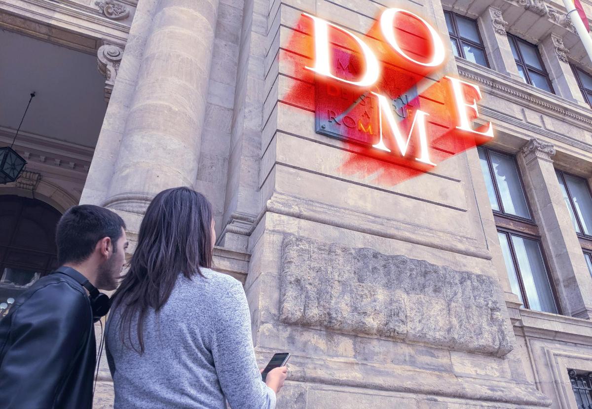 a man and a woman standing in front of a building