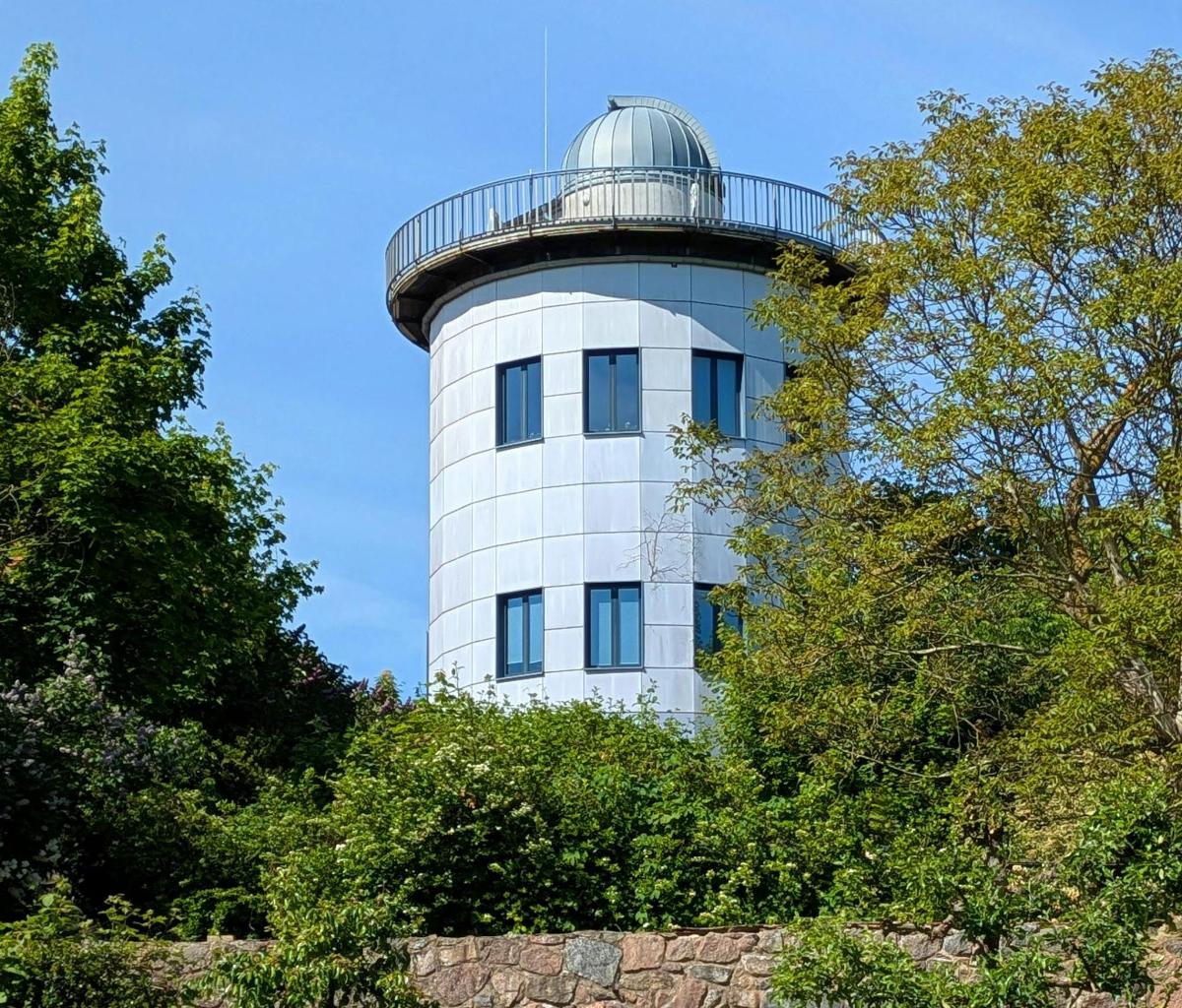 a white building with a dome on top of it