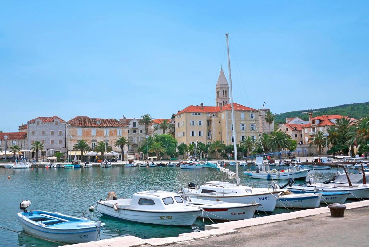 a bunch of boats are docked in a harbor