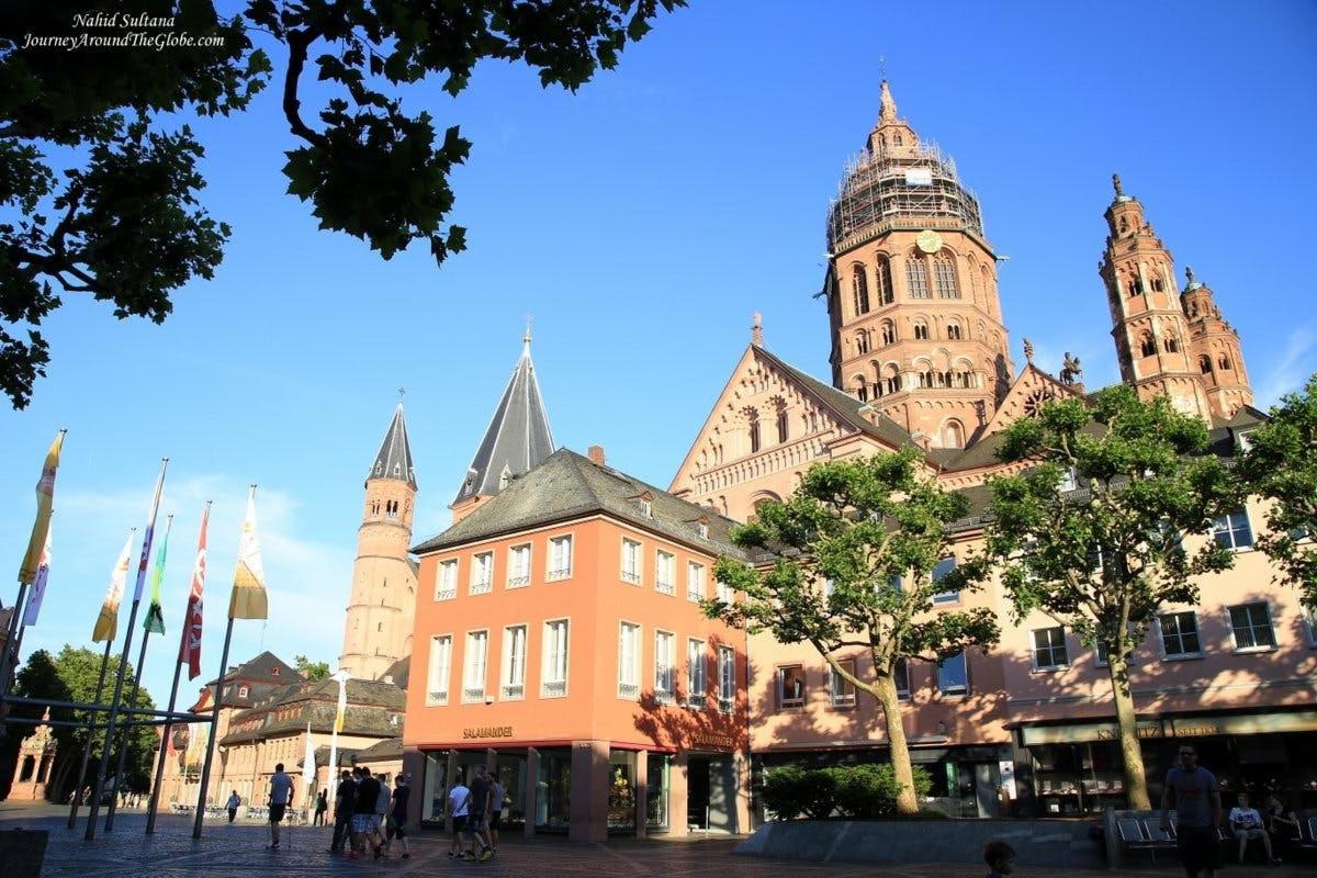 a large building with towers on top of it
