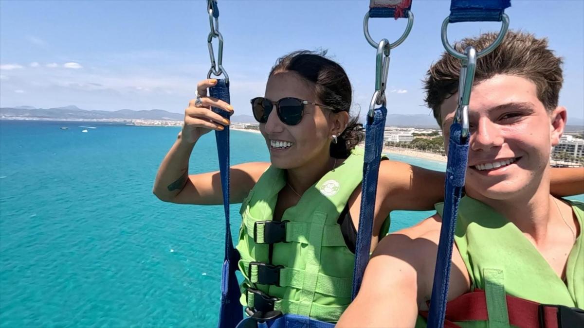 two people on a boat in the water