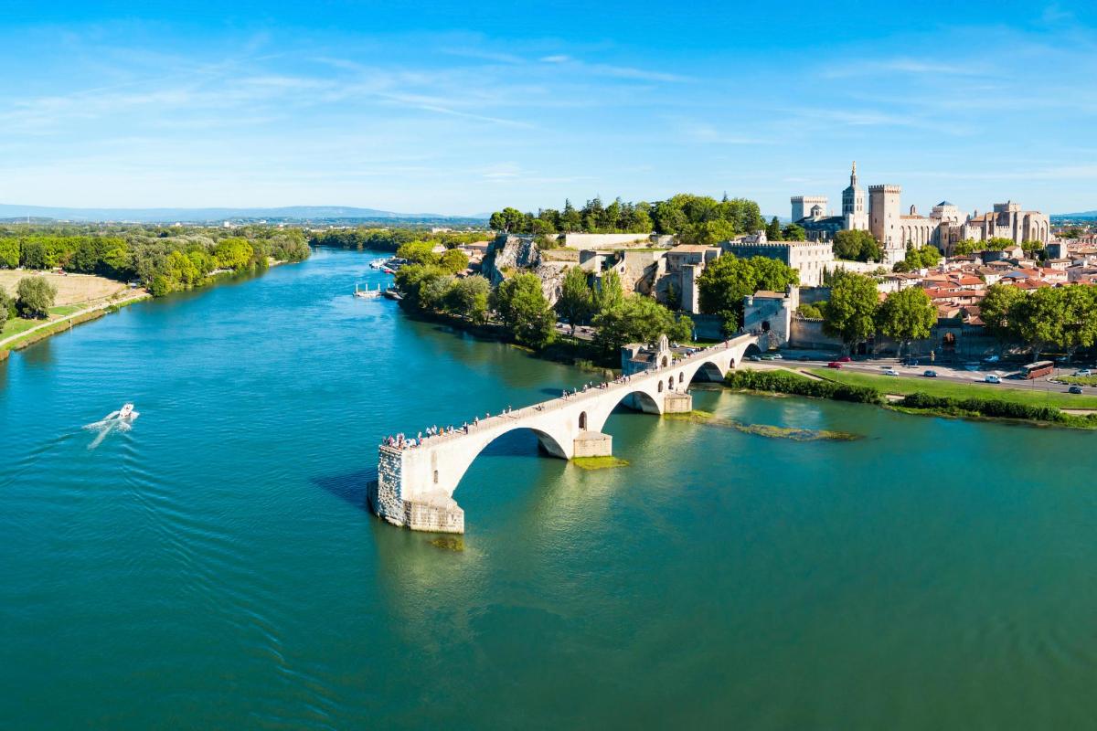 an aerial view of a bridge over a river