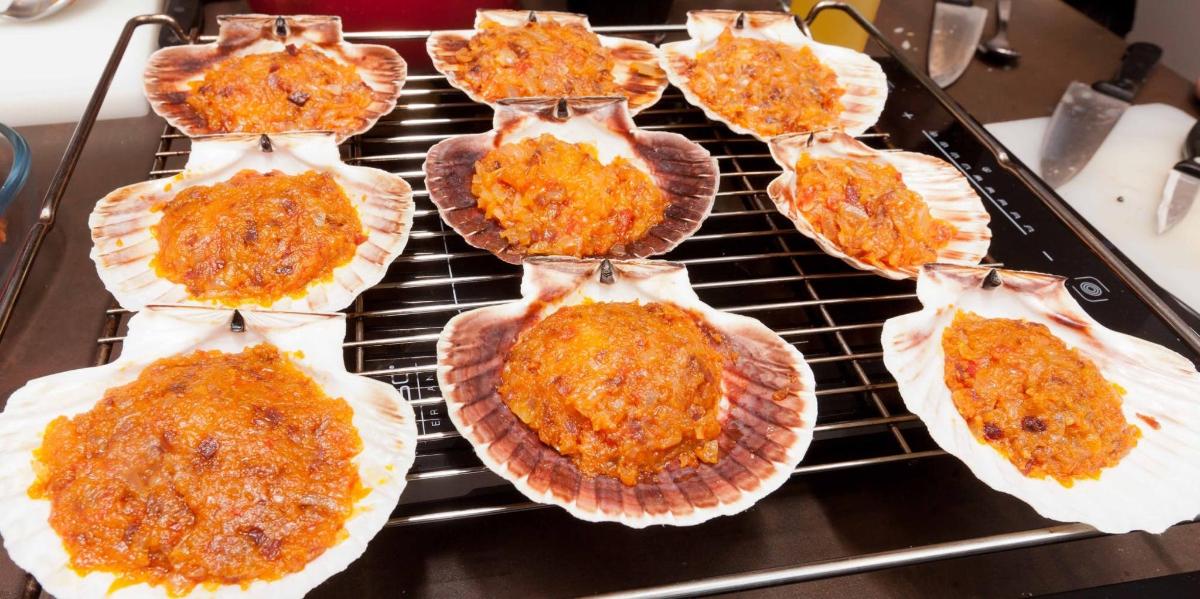 a bunch of pies sitting on top of an oven