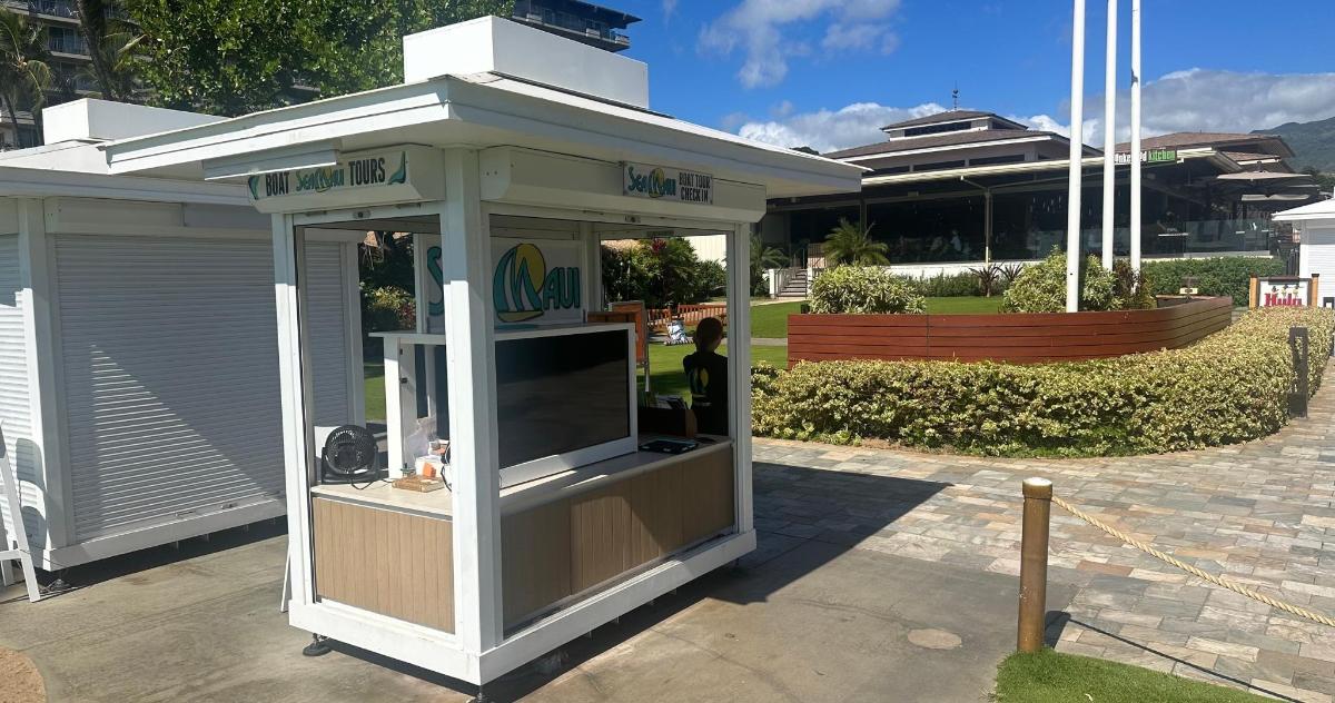 a food stand with a tv in it