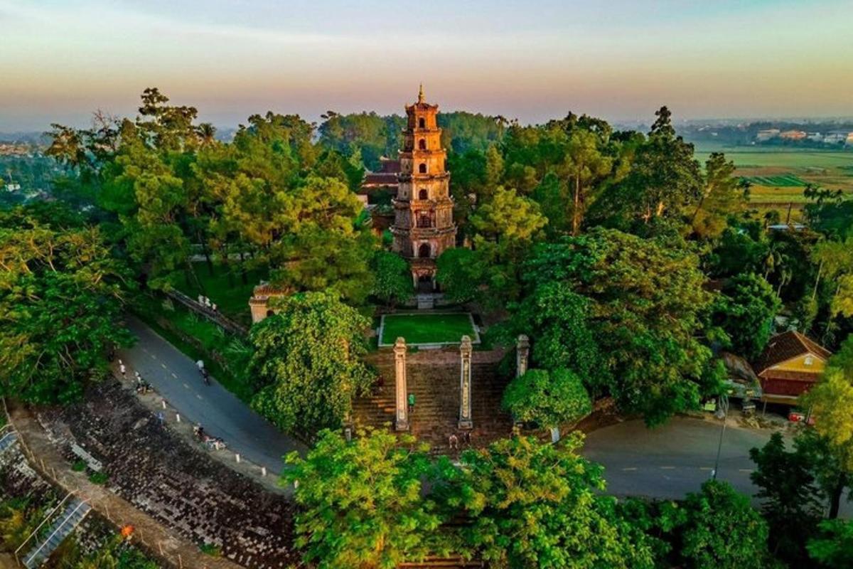 an overhead view of a building in a forest