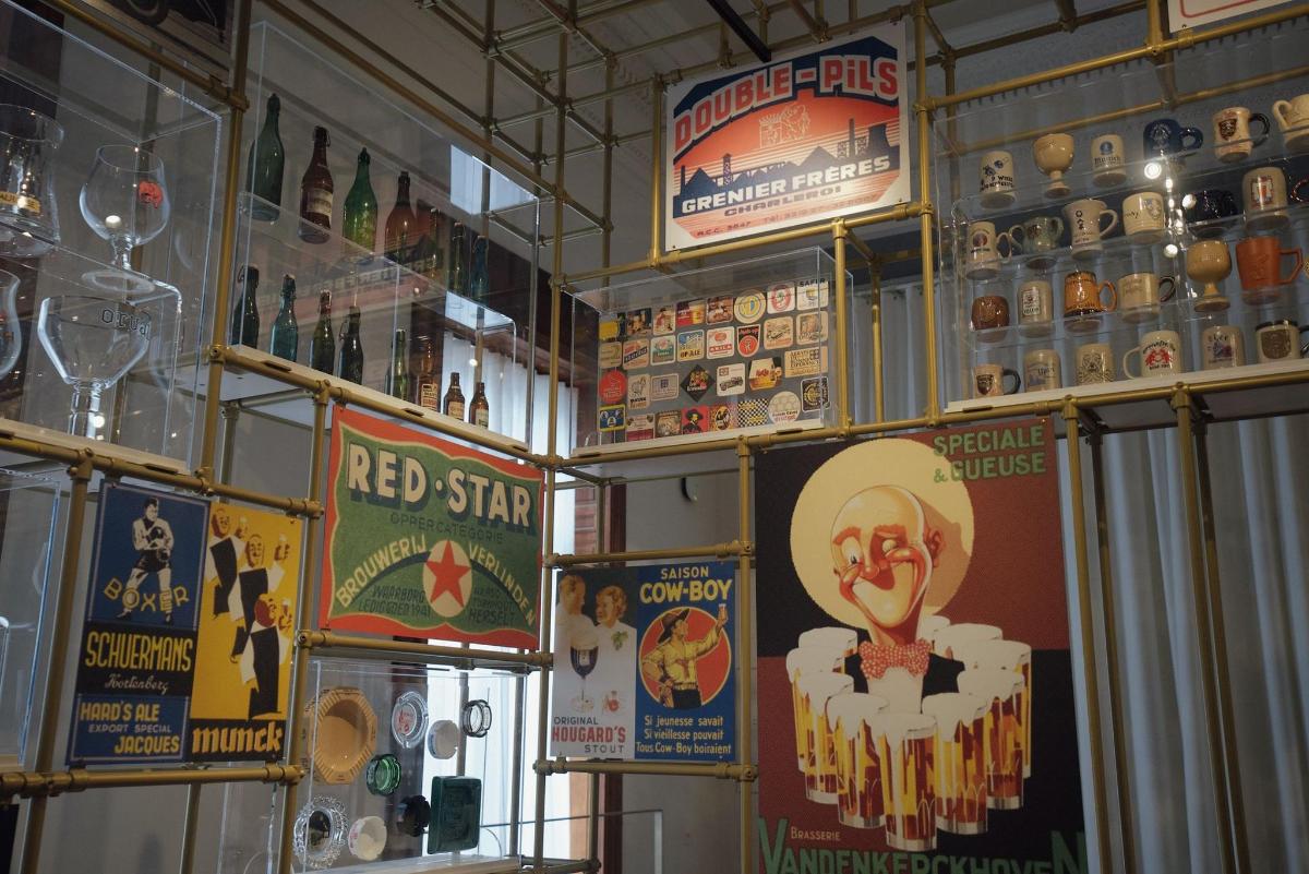 a bar with lots of signs on the wall