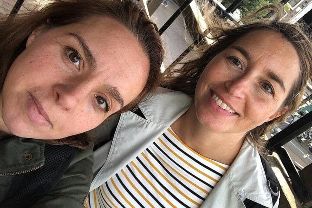 two women are sitting next to each other
