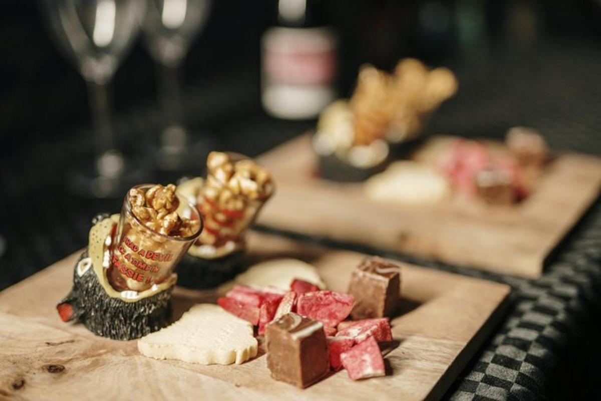 a plate of food on a table with desserts