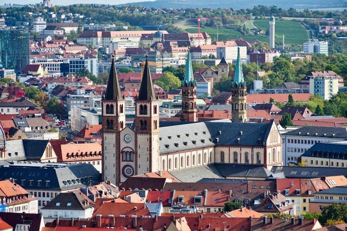 a large building with a clock tower in a city