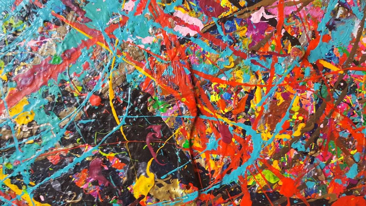 a close up of a painting with many colors