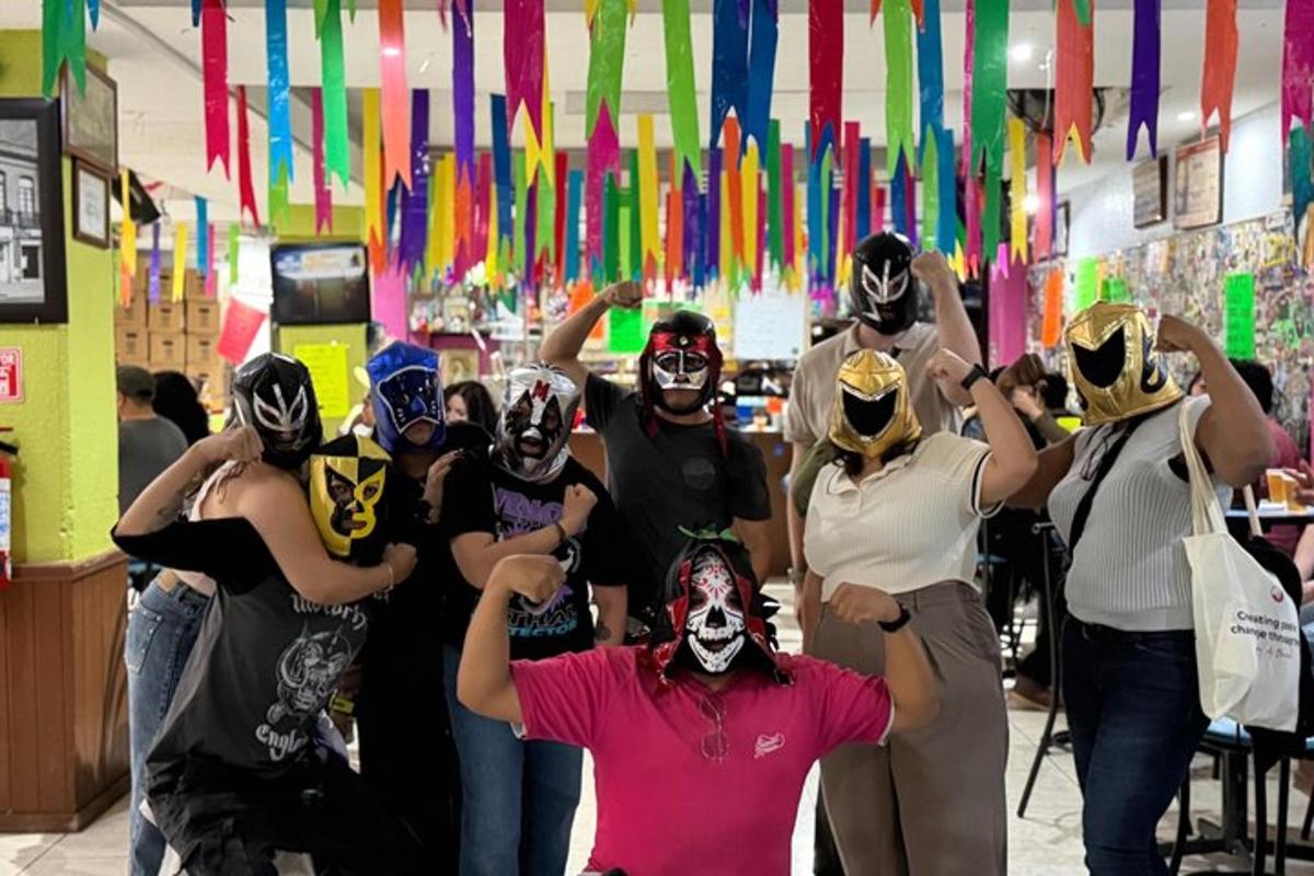 a group of people dressed in costumes posing for a picture