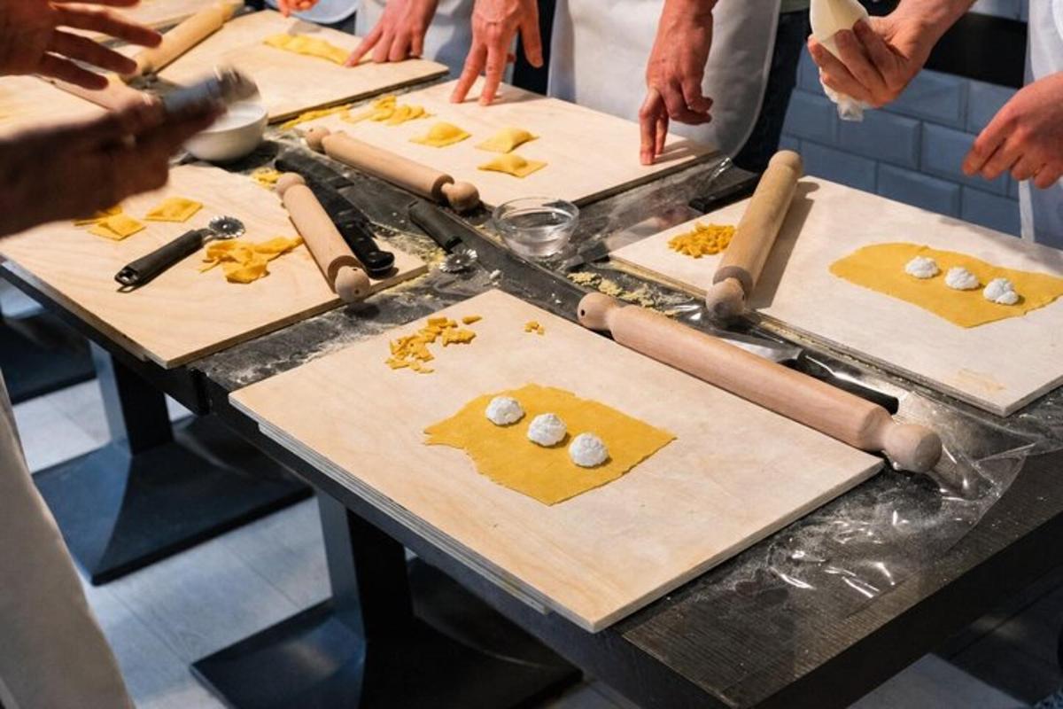 a group of people in a kitchen preparing food