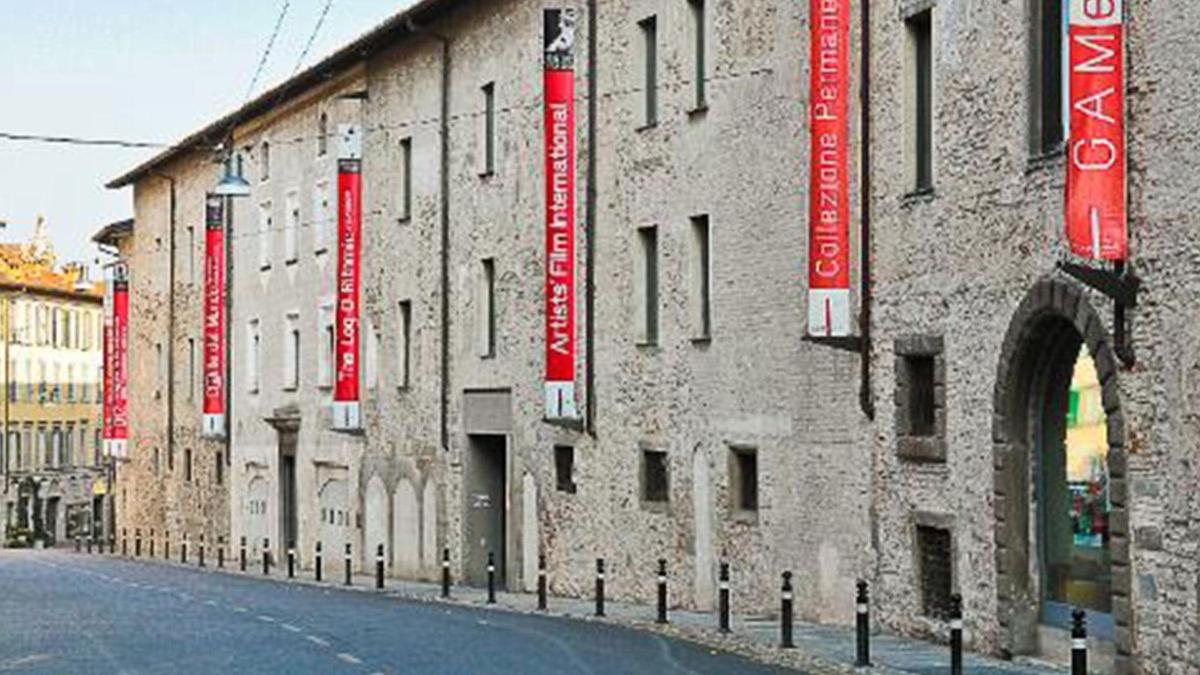 a building with red signs on the side of it