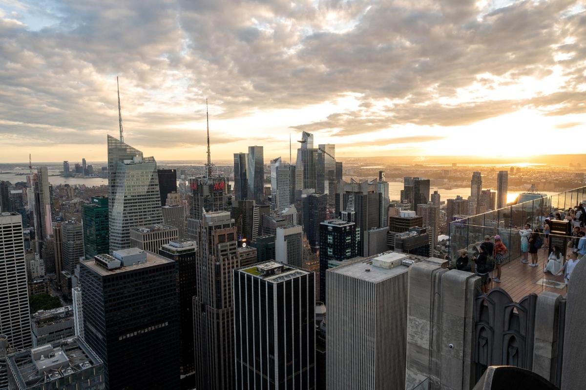 a view of a city from the top of a skyscraper