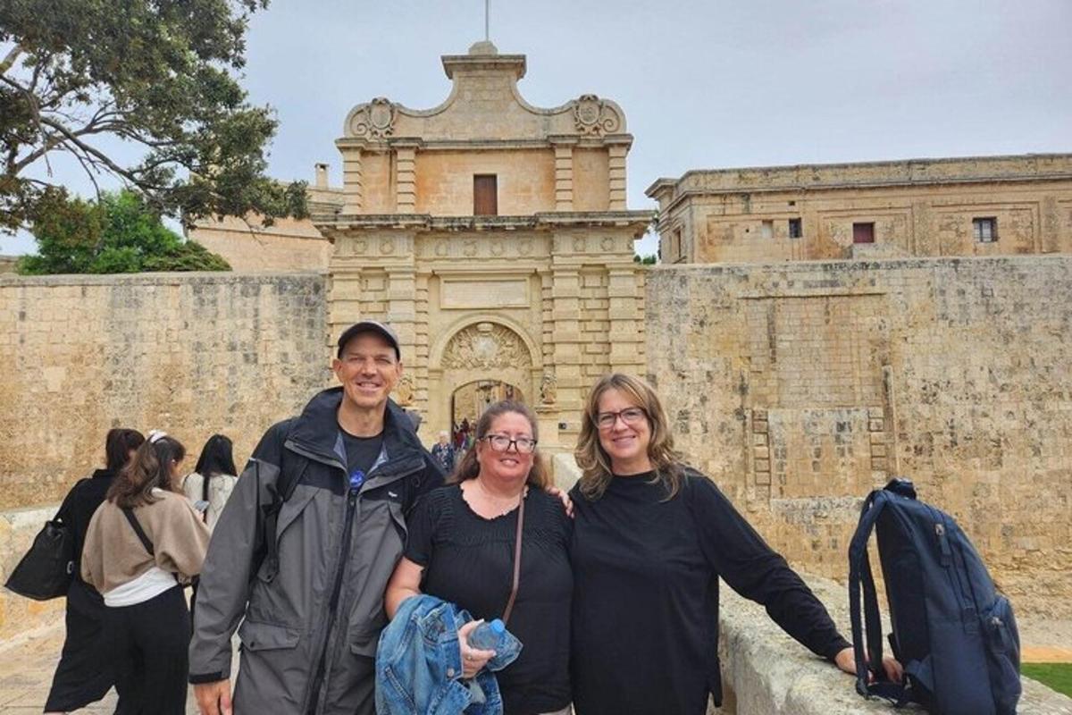 a group of people standing in front of a building