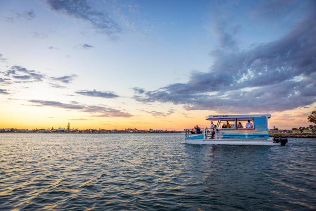 a boat in the water with people on it