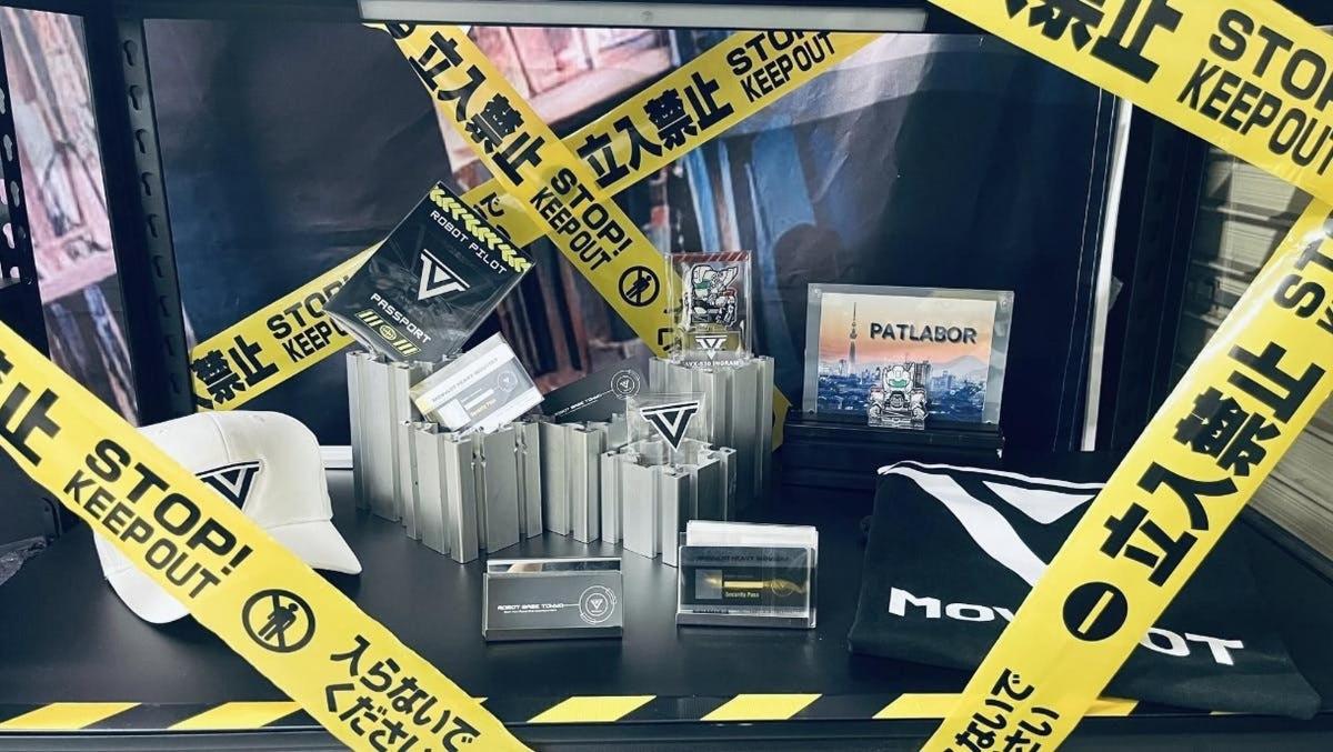 a table with yellow tape and signs on it