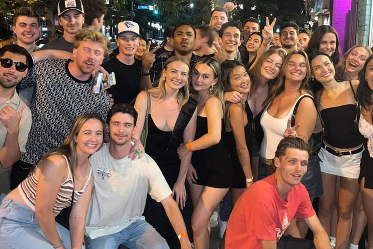a group of people posing for a picture at a party