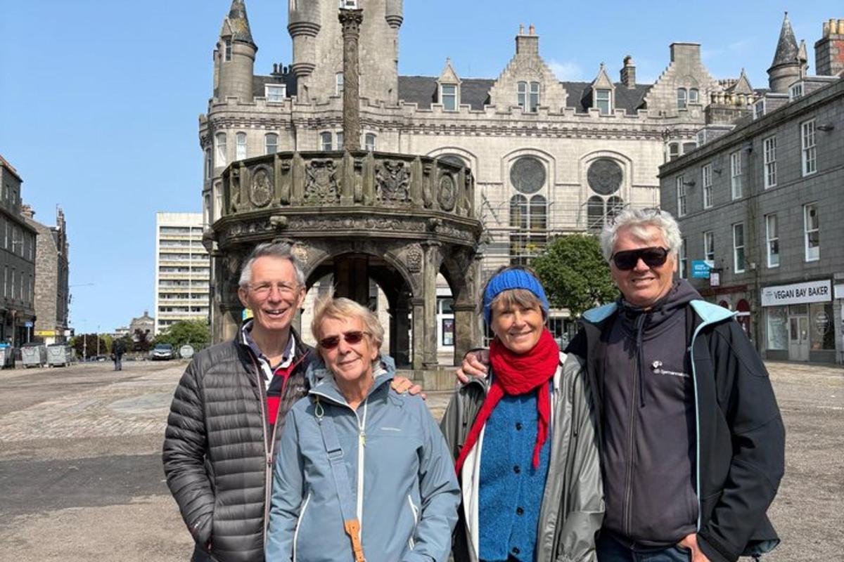 a group of people standing in front of a building