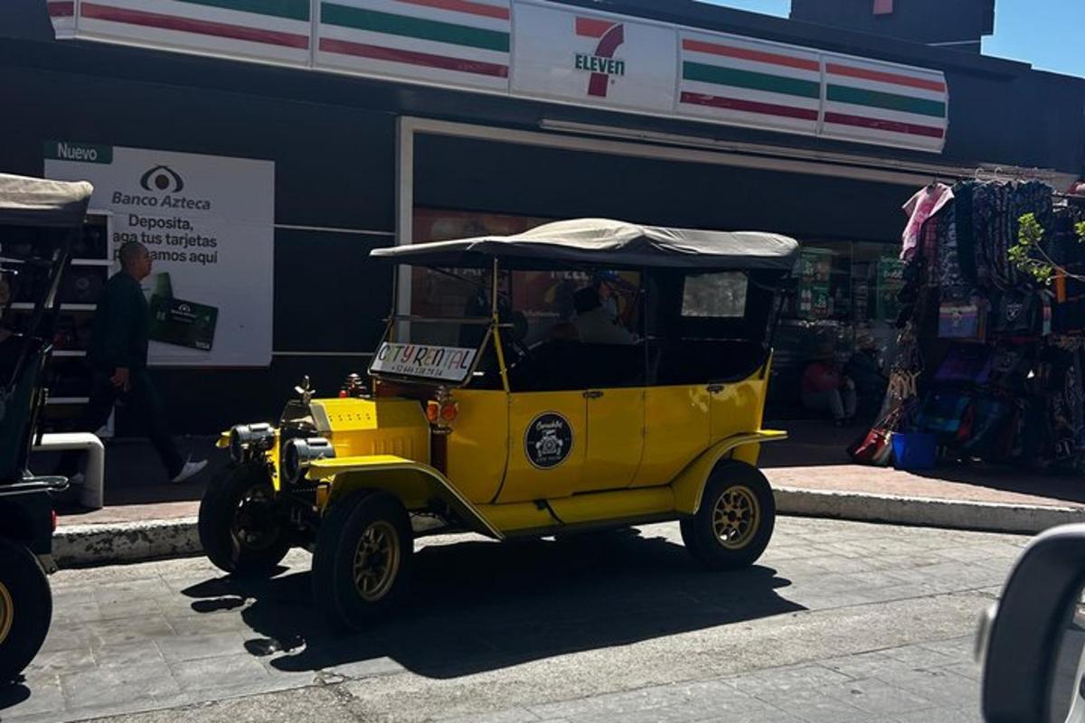 a yellow golf cart parked in front of a store
