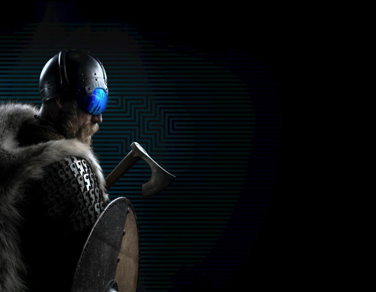 a man in a armour holding a baseball bat