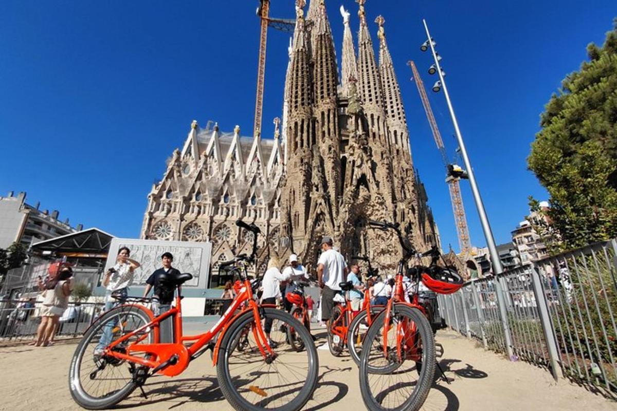 a group of bikes parked in front of a cathedral
