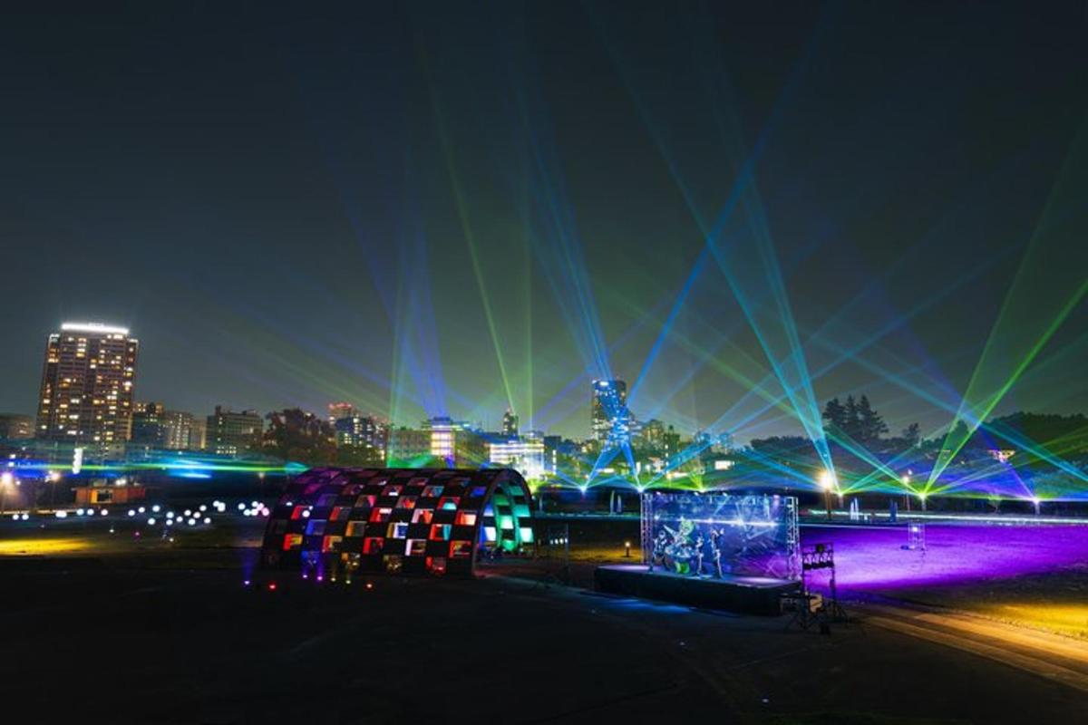 a city lit up at night with lights