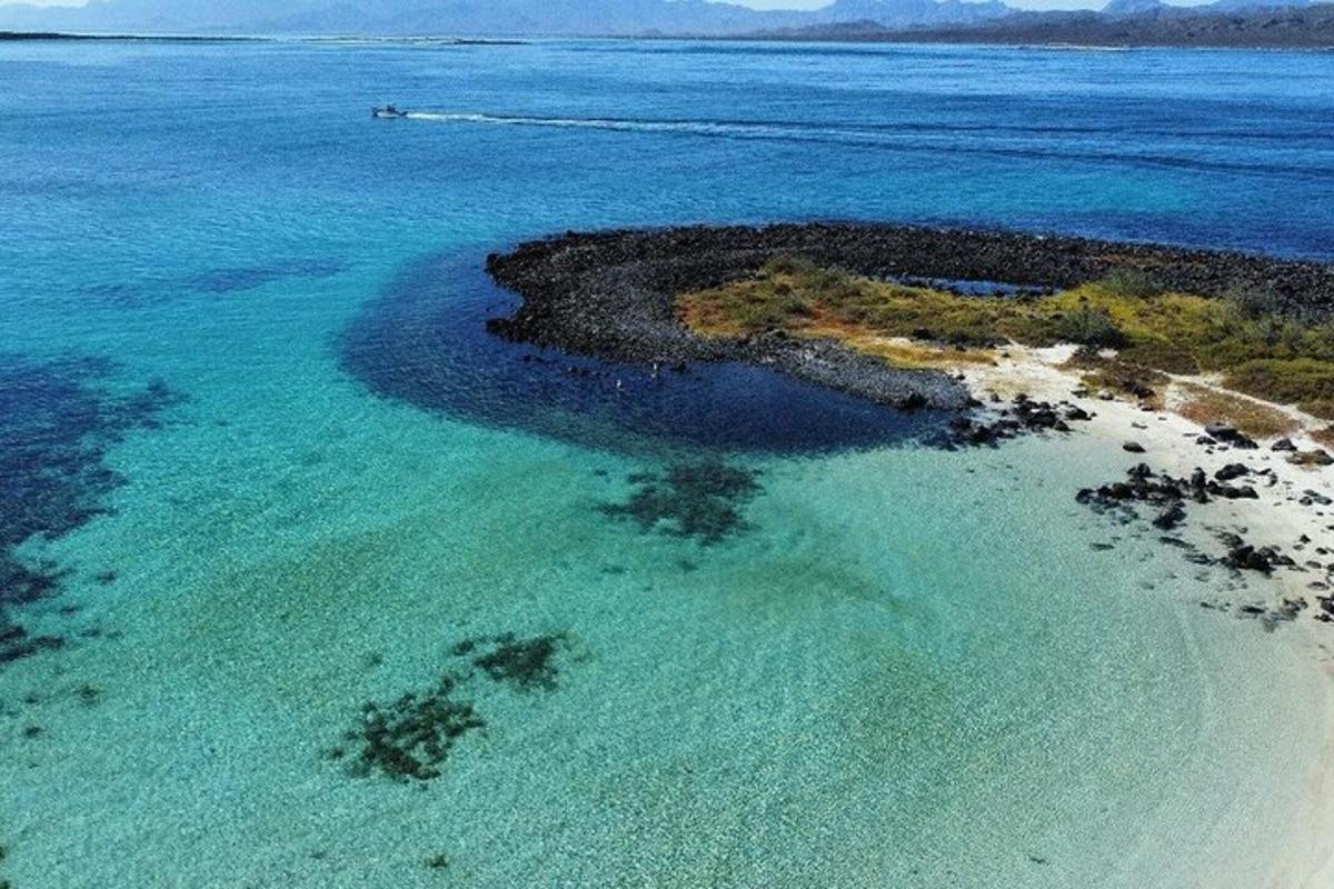 an aerial view of an island in the ocean