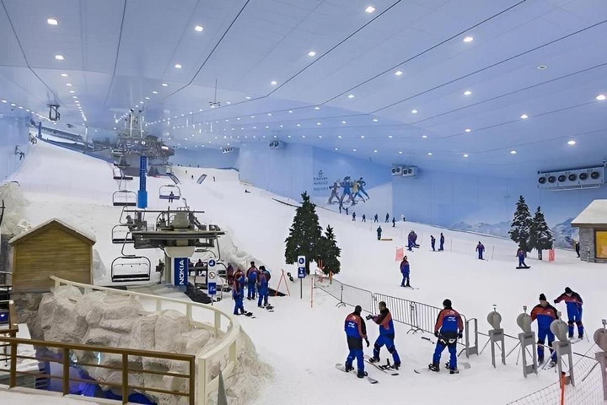 a group of people on a ski slope in a ski lodge