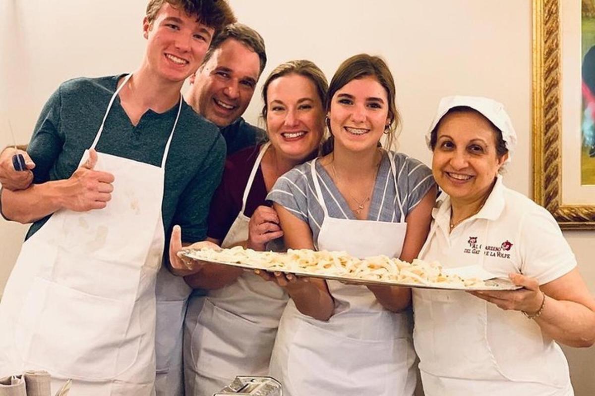 a group of people holding a tray of food