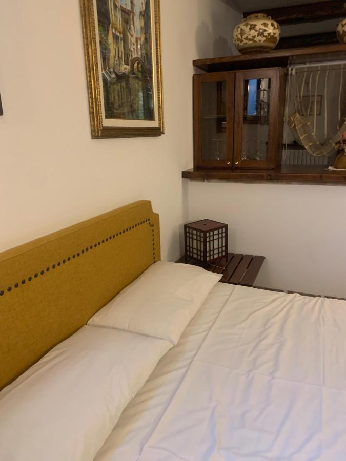 Letto o letti in una camera di Relais Garden Lecco