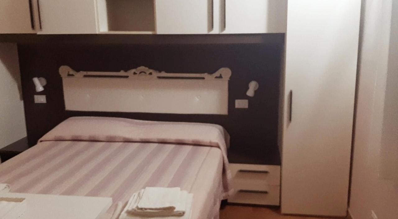 Letto o letti in una camera di La Maison One B&B