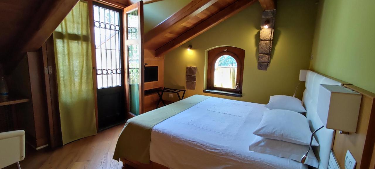 Letto o letti in una camera di Villa Di Natale
