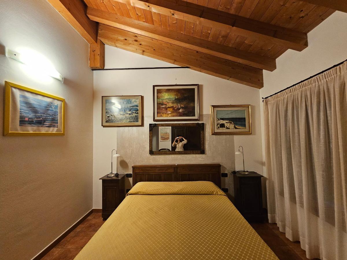 Letto o letti in una camera di Bio Agriturismo Vojon