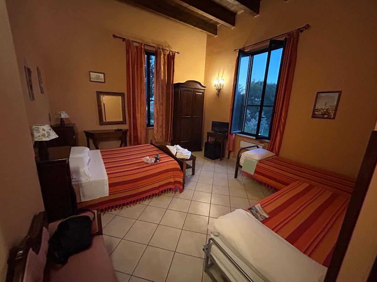 Letto o letti in una camera di Agriturismo Santa Chiara