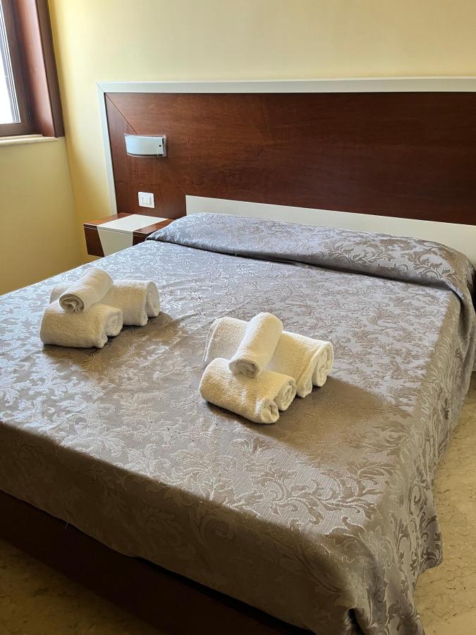 Letto o letti in una camera di Hotel Insonnia