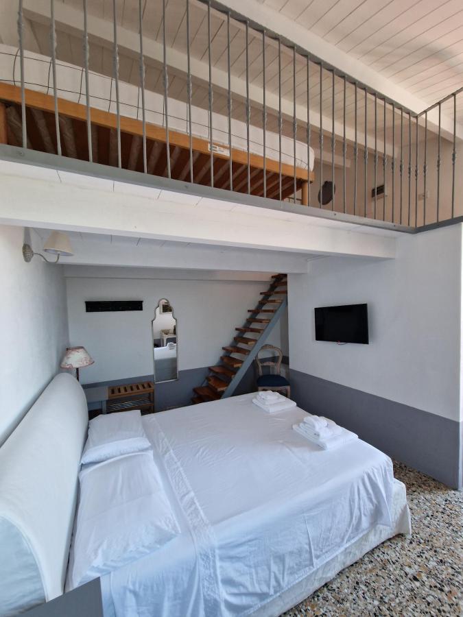 Letto o letti in una camera di Villa Maria Cristina