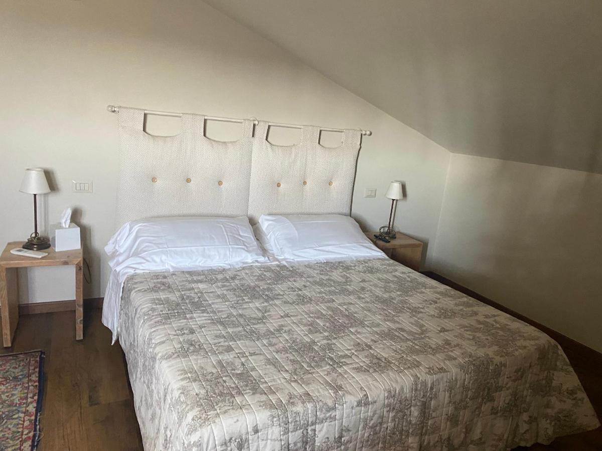 Letto o letti in una camera di Agriturismo Poderedodici