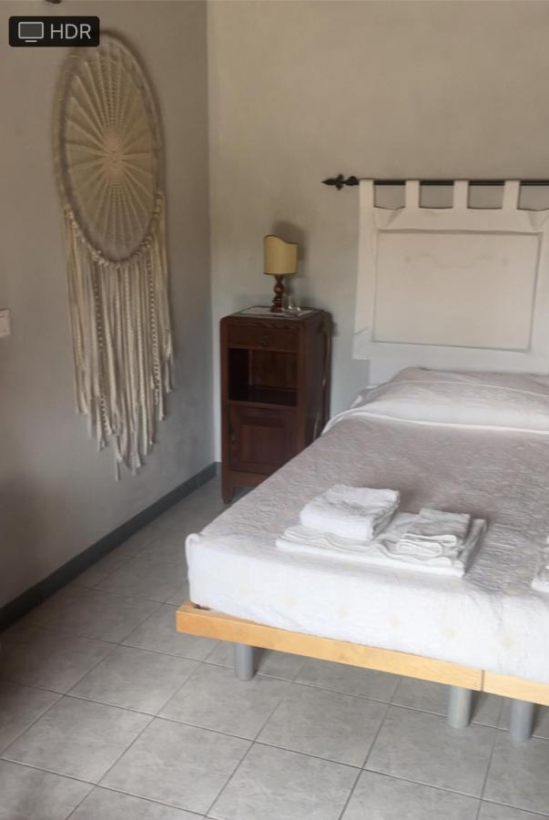 Letto o letti in una camera di La Meriggia Senigallia Agriturismo