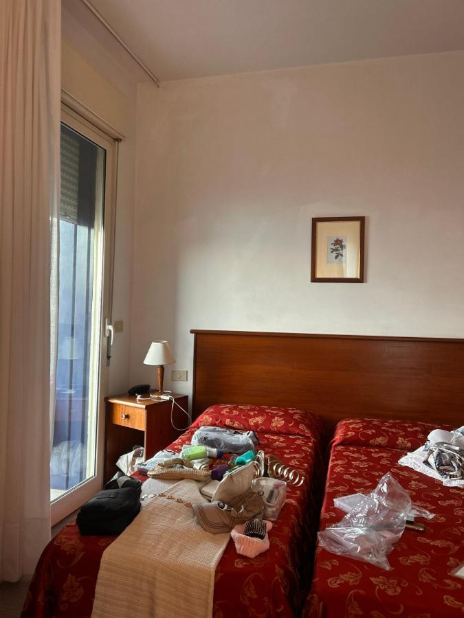 Letto o letti in una camera di Hotel Isola Bella