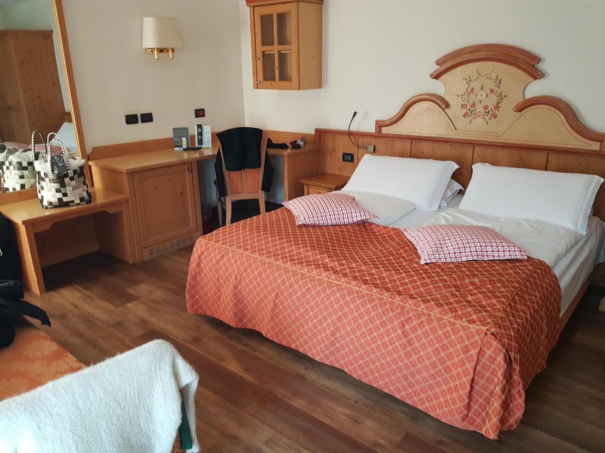 Letto o letti in una camera di Nature Wellness Hotel Renato
