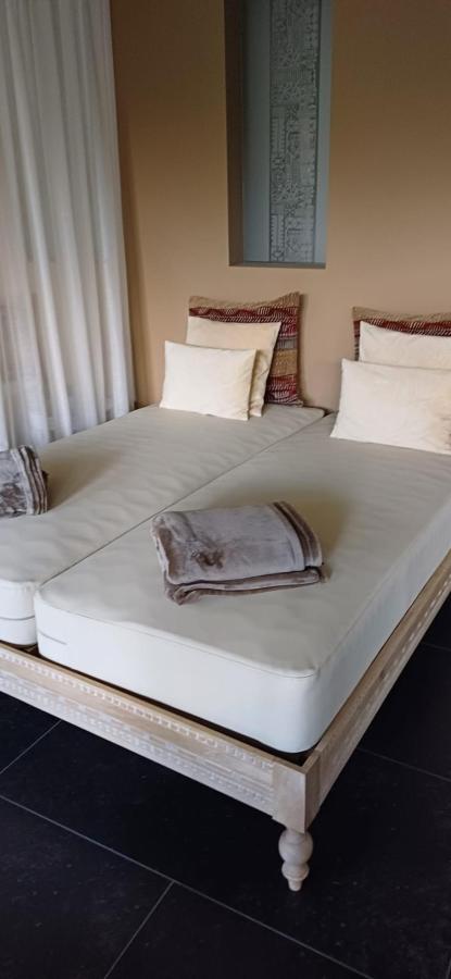 Letto o letti in una camera di Botango
