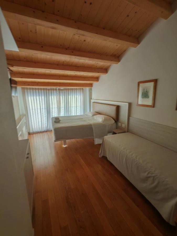 Letto o letti in una camera di Residenza Ai Capitelli