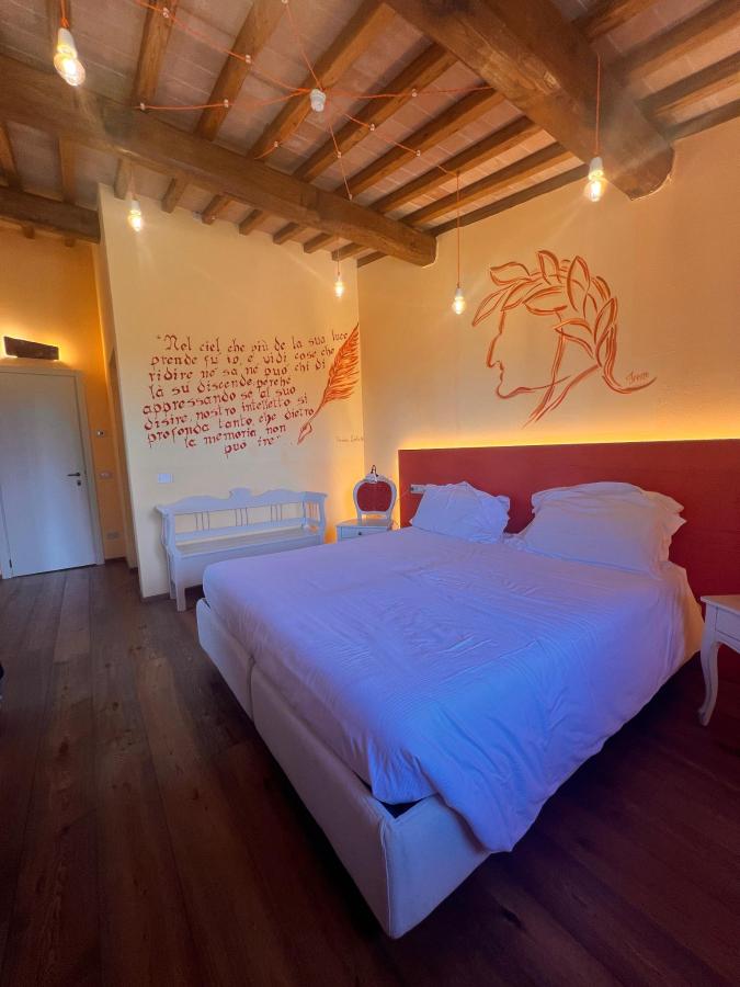 Letto o letti in una camera di Podere Benintendi