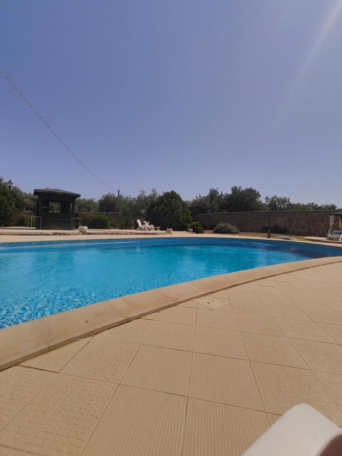 Piscina di Agriturismo Baglio Calanchi o nelle vicinanze