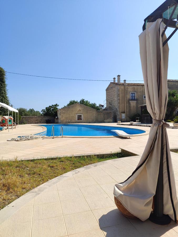 Piscina di Agriturismo Baglio Calanchi o nelle vicinanze